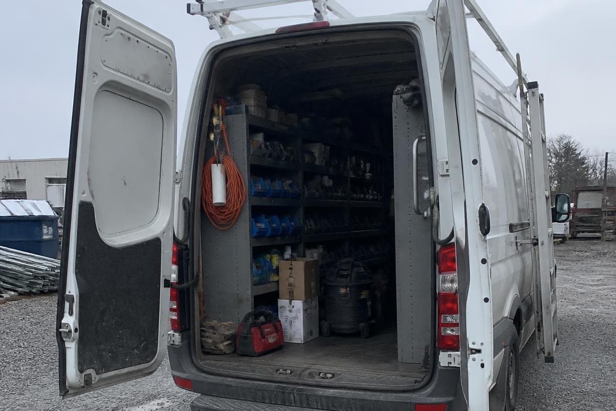 Upfitted Sprinter van with tools and equipment coverage
